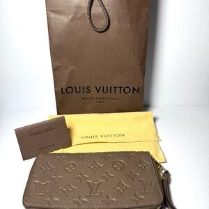 Louis Vuitton Embossed Leather Clutch